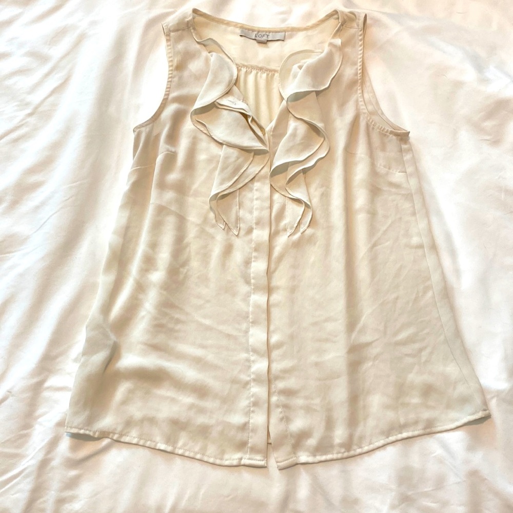 Ivory Ruffled Sleeveless Blouse